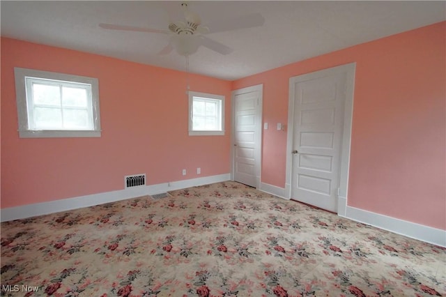 45 Mechanic St, Berlin Heights, OH 44814 - carpeted empty room with a ceiling fan and baseboards