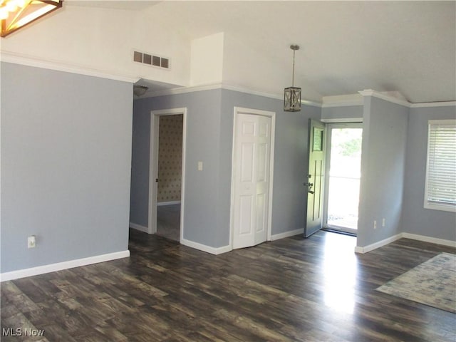 7527 Tamkrist Trl, Conneaut, OH 44030 - spare room with ornamental molding, lofted ceiling, and dark wood finished floors