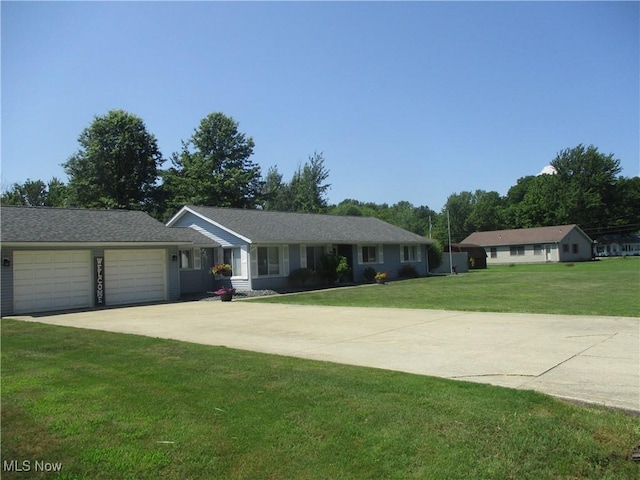 7527 Tamkrist Trl, Conneaut, OH 44030 - single story home with a garage, a front lawn, and driveway