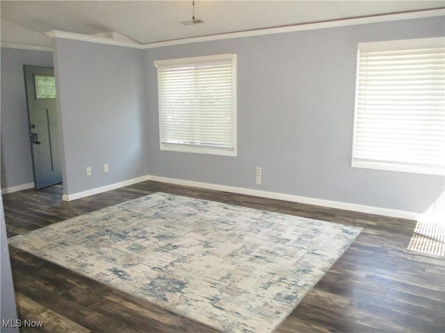 7527 Tamkrist Trl, Conneaut, OH 44030 - spare room featuring crown molding and dark wood-type flooring