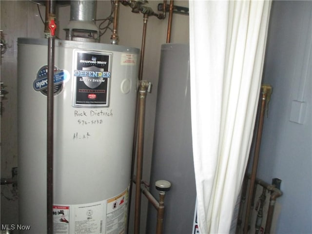7527 Tamkrist Trl, Conneaut, OH 44030 - utility room with gas water heater and water heater