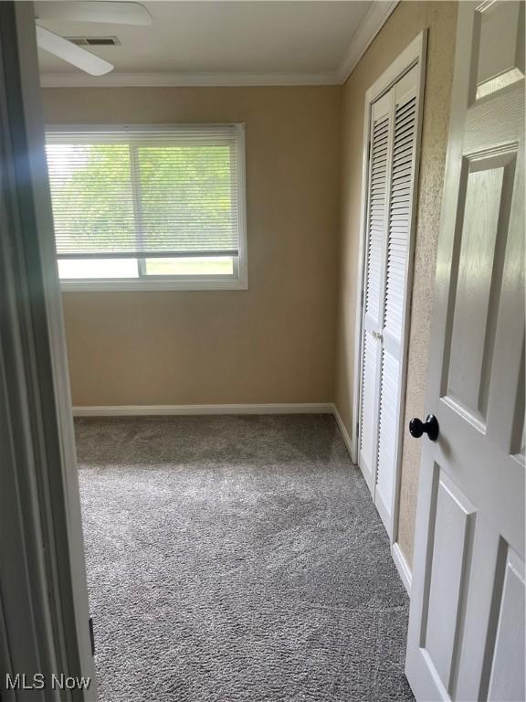 7527 Tamkrist Trl, Conneaut, OH 44030 - unfurnished room with carpet floors and ornamental molding