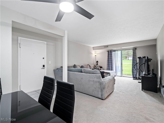 8455 N Akins Rd Unit 103, North Royalton, OH 44133 - living area featuring a ceiling fan and light carpet