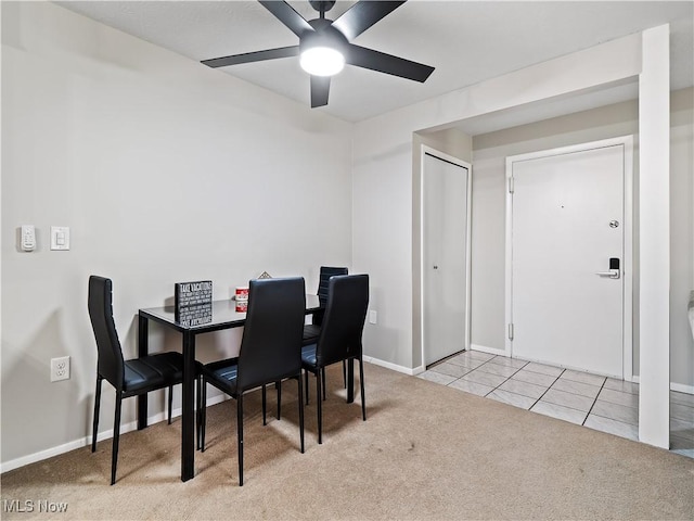 8455 N Akins Rd Unit 103, North Royalton, OH 44133 - carpeted dining room with ceiling fan and tile patterned floors