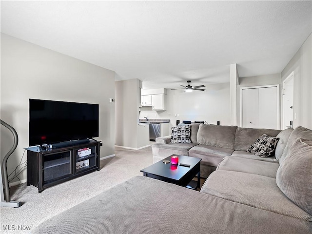 8455 N Akins Rd Unit 103, North Royalton, OH 44133 - carpeted living area featuring baseboards and ceiling fan