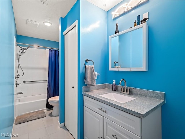 8455 N Akins Rd Unit 103, North Royalton, OH 44133 - bathroom with vanity, shower / bath combo with shower curtain, and tile patterned flooring