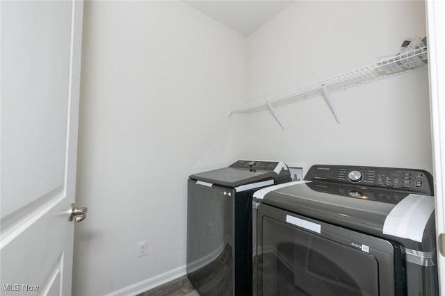 1637 Duncan Way, Streetsboro, OH 44241 - laundry room with washing machine and clothes dryer and wood finished floors