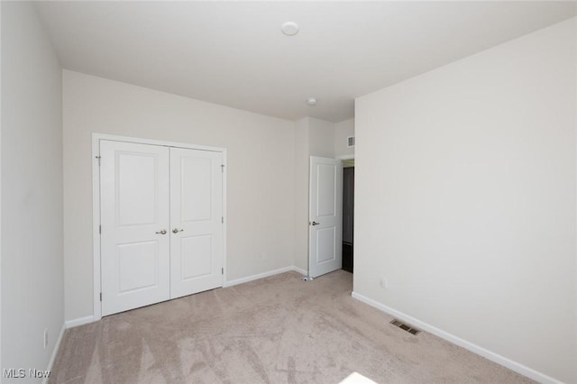 1637 Duncan Way, Streetsboro, OH 44241 - unfurnished bedroom featuring light colored carpet and a closet