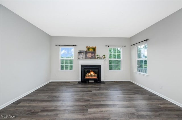 1637 Duncan Way, Streetsboro, OH 44241 - unfurnished living room featuring a fireplace with flush hearth and dark wood finished floors