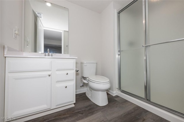 1637 Duncan Way, Streetsboro, OH 44241 - bathroom featuring a shower with door, vanity, and wood finished floors