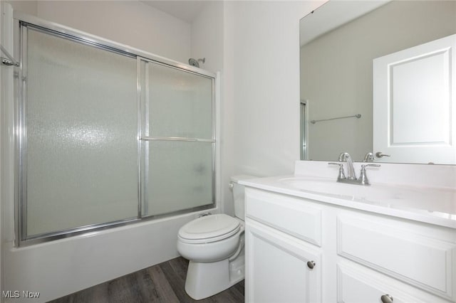 1637 Duncan Way, Streetsboro, OH 44241 - bathroom featuring vanity, wood finished floors, and shower / bath combination with glass door