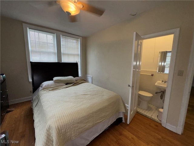 15610 Van Aken Blvd Unit 5, Shaker Heights, OH 44120 - bedroom with wood finished floors, ensuite bathroom, and a ceiling fan