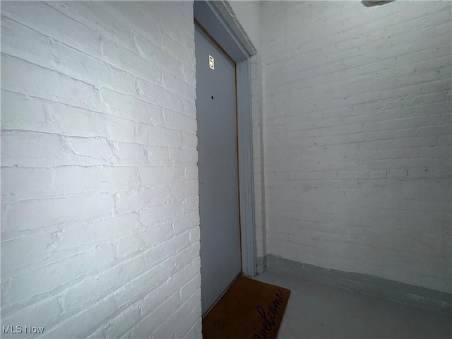 15610 Van Aken Blvd Unit 5, Shaker Heights, OH 44120 - hallway with concrete flooring