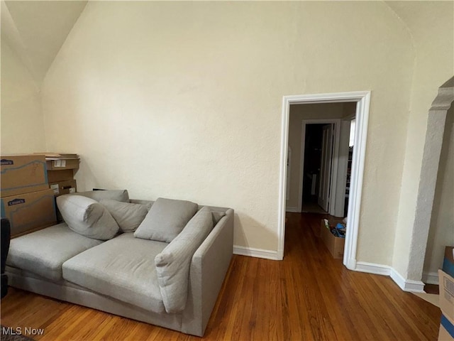 15610 Van Aken Blvd Unit 5, Shaker Heights, OH 44120 - living area featuring wood finished floors and vaulted ceiling