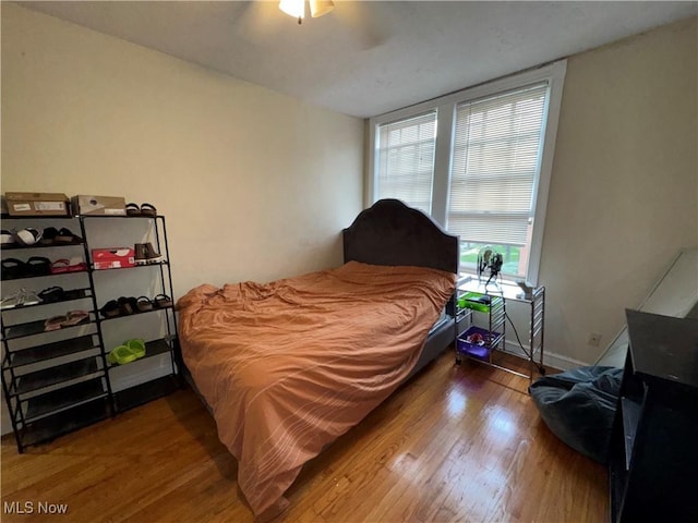 15610 Van Aken Blvd Unit 5, Shaker Heights, OH 44120 - bedroom with wood finished floors and a ceiling fan