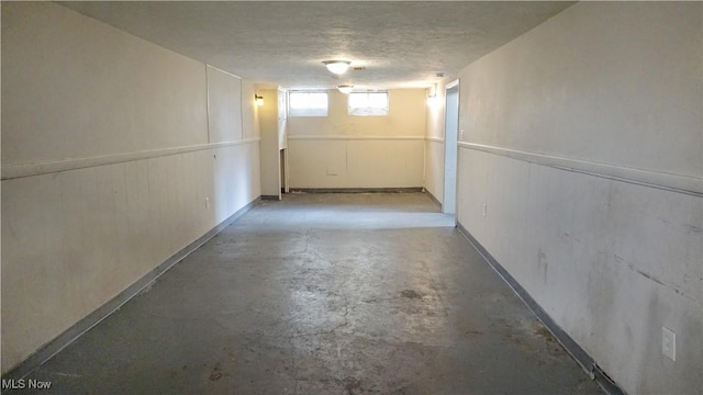 20737 Bowling Green Rd, Maple Heights, OH 44137 - basement featuring wainscoting and a textured ceiling