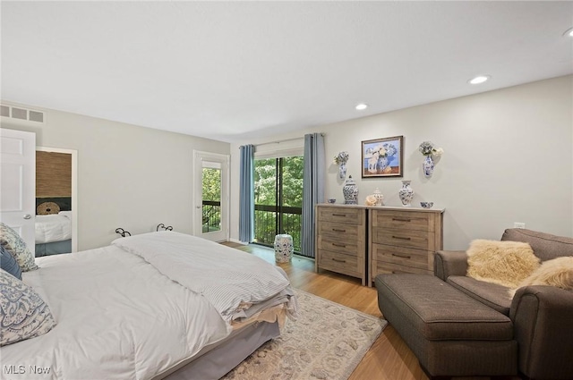 629-37 Fairington Oval, Aurora, OH 44202 - bedroom featuring light wood-style floors and recessed lighting