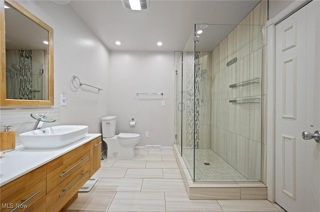 629-37 Fairington Oval, Aurora, OH 44202 - bathroom with vanity, a stall shower, and recessed lighting