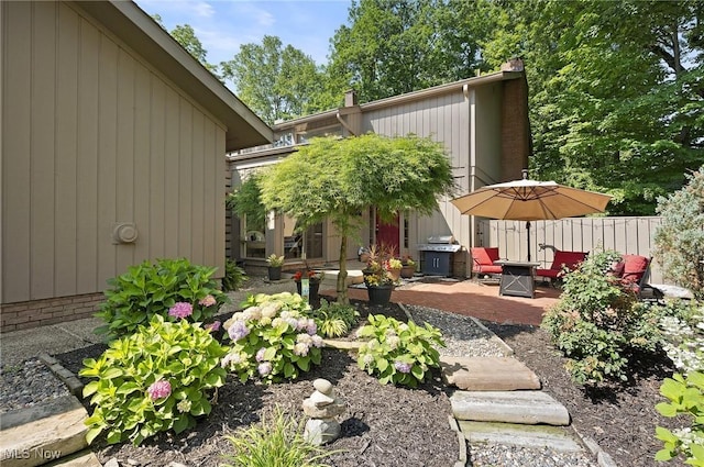 629-37 Fairington Oval, Aurora, OH 44202 - view of yard featuring a patio area