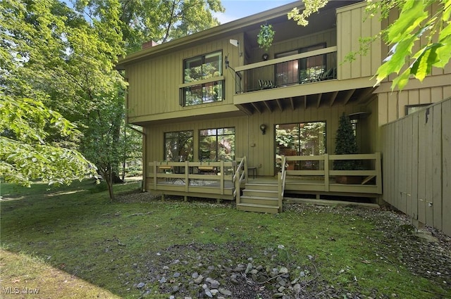 629-37 Fairington Oval, Aurora, OH 44202 - rear view of property featuring a balcony and a chimney