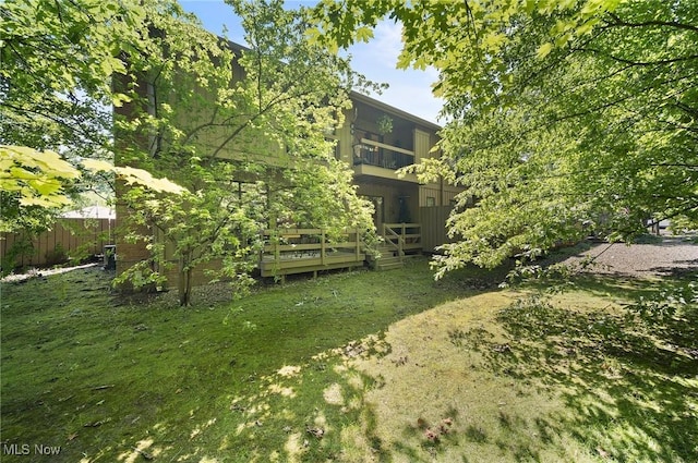 629-37 Fairington Oval, Aurora, OH 44202 - view of yard featuring a wooden deck