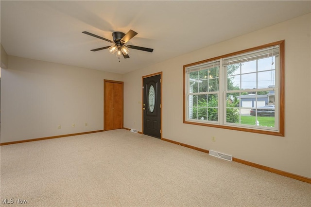 103 Beech St, Doylestown, OH 44230 - carpeted empty room featuring baseboards and a ceiling fan