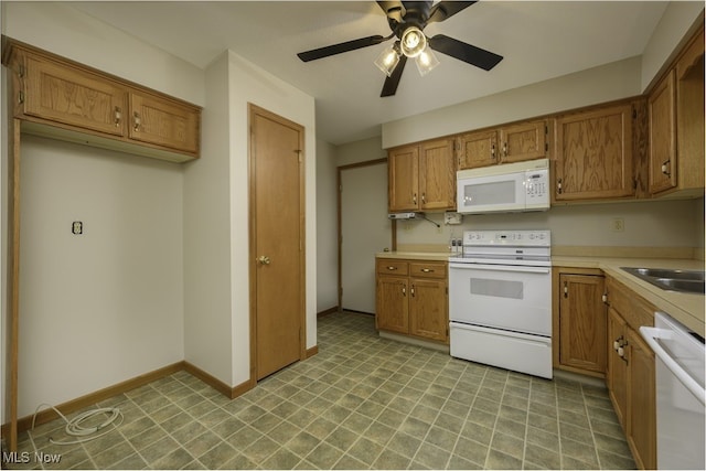 103 Beech St, Doylestown, OH 44230 - kitchen featuring white appliances, brown cabinets, light countertops, and a ceiling fan