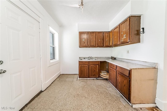 1150 W 5th St, Lorain, OH 44052 - bar featuring a sink and baseboards