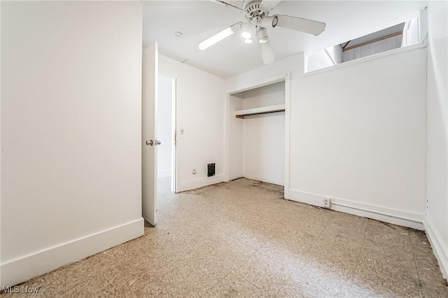 1150 W 5th St, Lorain, OH 44052 - unfurnished bedroom featuring tile patterned floors, a closet, and a ceiling fan
