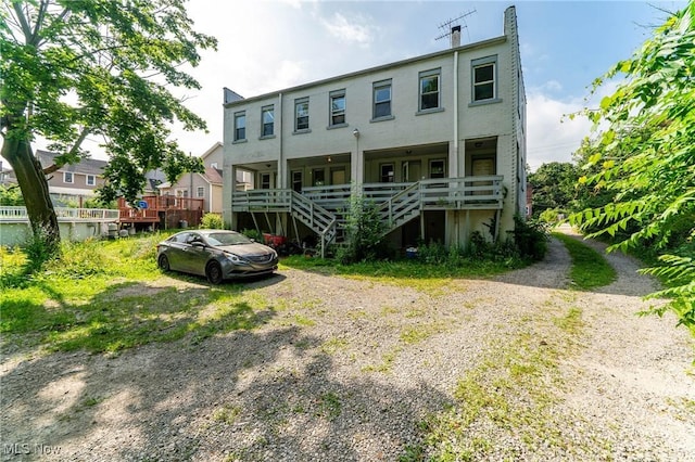 1150 W 5th St, Lorain, OH 44052 - back of house featuring stairway