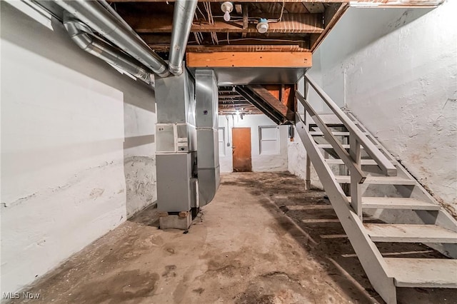 1150 W 5th St, Lorain, OH 44052 - unfinished basement with stairs and heating unit