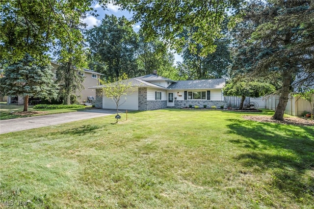 4499 Camellia Ln, North Olmsted, OH 44070 - view of front facade with driveway and an attached garage