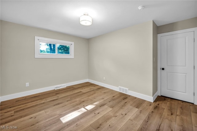4499 Camellia Ln, North Olmsted, OH 44070 - spare room featuring a smoke detector and light wood finished floors