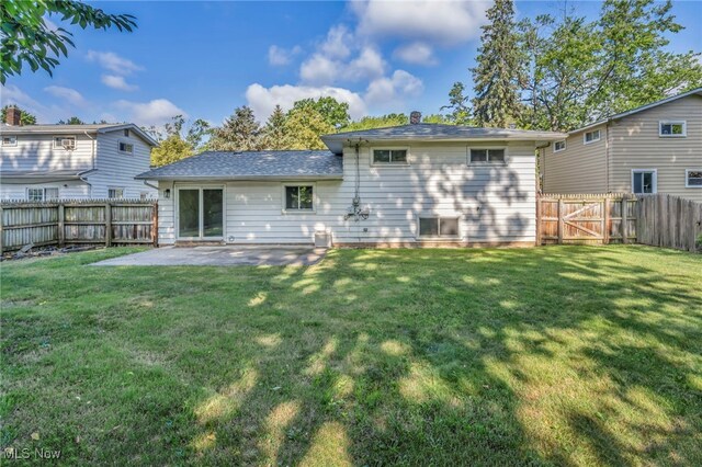 4499 Camellia Ln, North Olmsted, OH 44070 - back of house with a patio area, a fenced backyard, and a gate