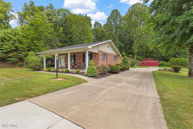 33362 State Route 833, Pomeroy, OH 45769 - ranch-style house featuring covered porch, brick siding, a front lawn, and concrete driveway