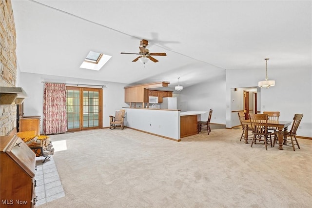 33362 State Route 833, Pomeroy, OH 45769 - living area featuring vaulted ceiling, ceiling fan, light colored carpet, and a skylight