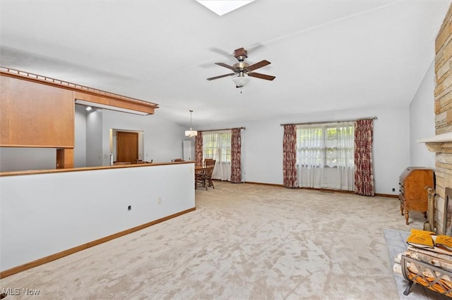 33362 State Route 833, Pomeroy, OH 45769 - unfurnished living room featuring carpet flooring, a ceiling fan, and a fireplace