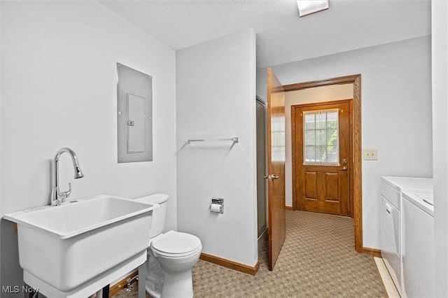 33362 State Route 833, Pomeroy, OH 45769 - bathroom with electric panel, washing machine and dryer, a shower with shower door, and vanity