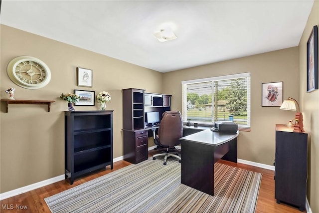 6713 Mackenzie Rd, North Olmsted, OH 44070 - office space featuring baseboards and wood finished floors