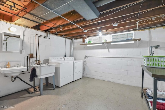 6713 Mackenzie Rd, North Olmsted, OH 44070 - basement with washing machine and clothes dryer and concrete block wall