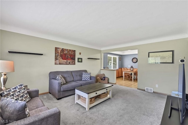 6713 Mackenzie Rd, North Olmsted, OH 44070 - carpeted living area with baseboards