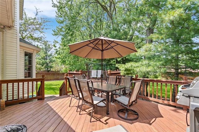 525 Bishop Pl, Berea, OH 44017 - wooden deck with outdoor dining space and grilling area