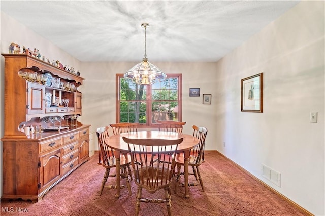 525 Bishop Pl, Berea, OH 44017 - dining room with light colored carpet and a chandelier