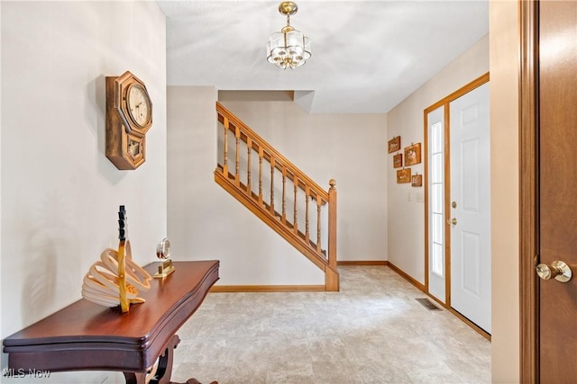525 Bishop Pl, Berea, OH 44017 - foyer entrance featuring stairway and a chandelier