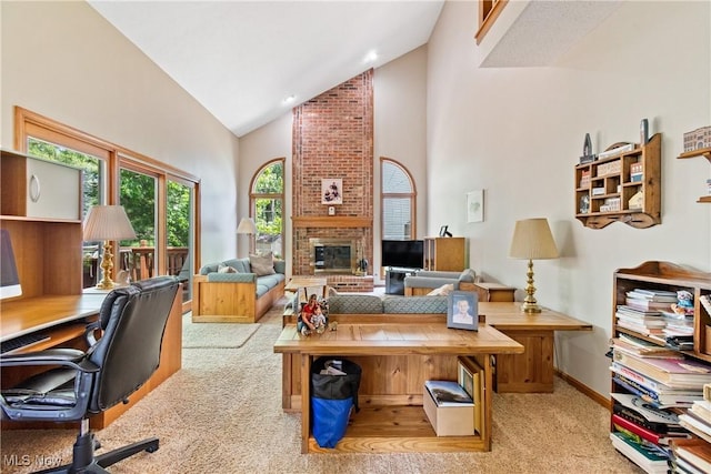 525 Bishop Pl, Berea, OH 44017 - home office with carpet floors, high vaulted ceiling, and a brick fireplace