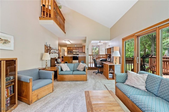 525 Bishop Pl, Berea, OH 44017 - living room featuring a desk, high vaulted ceiling, light carpet, and a ceiling fan