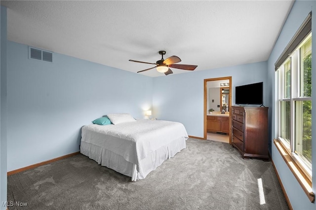 1036 Larkens Way, Medina, OH 44256 - bedroom featuring light colored carpet, ceiling fan, and ensuite bathroom