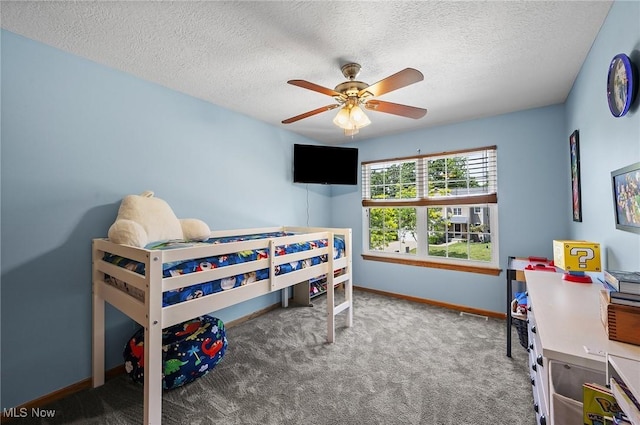 1036 Larkens Way, Medina, OH 44256 - carpeted bedroom with a textured ceiling and a ceiling fan