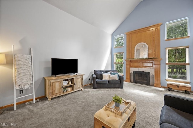 1036 Larkens Way, Medina, OH 44256 - carpeted living area with high vaulted ceiling and a tile fireplace