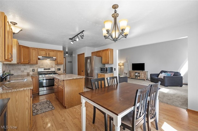 1036 Larkens Way, Medina, OH 44256 - dining space with a chandelier and light wood-style flooring